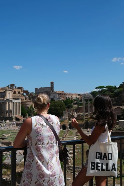 Two guests looking out over the Roman Forum
